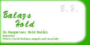 balazs hold business card